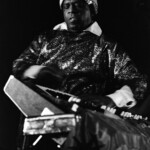 7/77. Ann Arbor, Michigan. SunRa and the Arkestra. Photo by Peter Yates.