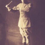 884555 Lieutenant James Reese Europe, c.1915 (b/w photo) by American Photographer, (20th century); New York Public Library, USA; (add.info.: James Reese Europe (22 February 1881 – 9 May 1919) was an American ragtime and early jazz bandleader, arranger, and composer. He was the leading figure on the African-American music scene of New York City in the 1910s. Eubie Blake called him the "Martin Luther King of music."); American, it is possible that some works by this artist may be protected by third party rights in some territories.