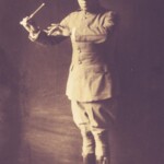 884555 Lieutenant James Reese Europe, c.1915 (b/w photo) by American Photographer, (20th century); New York Public Library, USA; (add.info.: James Reese Europe (22 February 1881 – 9 May 1919) was an American ragtime and early jazz bandleader, arranger, and composer. He was the leading figure on the African-American music scene of New York City in the 1910s. Eubie Blake called him the "Martin Luther King of music."); American, it is possible that some works by this artist may be protected by third party rights in some territories.