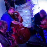 Evan Parker (saxophone and clarinet), John Russell (guitar) and John Edwards (double bass)