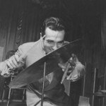 American jazz drummer and bandleader Gene Krupa (1909 - 1973) plays both sides of a cymbal, circa 1940. (Photo by FPG/Archive Photos/Getty Images)