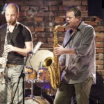 Cracow, Poland - November 19, 2013: Waclaw Zimpel and Ken Vandermark during concert in Cracow. Concert takes place as a part of 8. Krakow Jazz Autumn Festival.