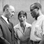 Vocalese trio formed by jazz vocalists Dave Lambert (left), Annie Ross (center) and Jon Hendricks (right) during a photo shoot for DownBeat magazine. This image was used as the front cover of the issue, published on 17th September 1959.
